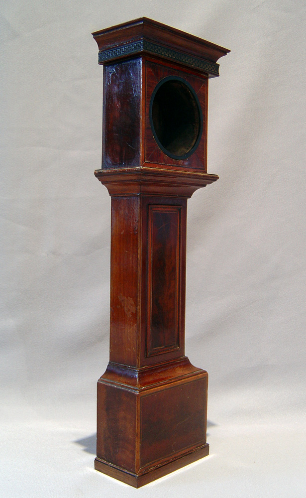 Watch stand in form of inlaid mahogany longcase clock.