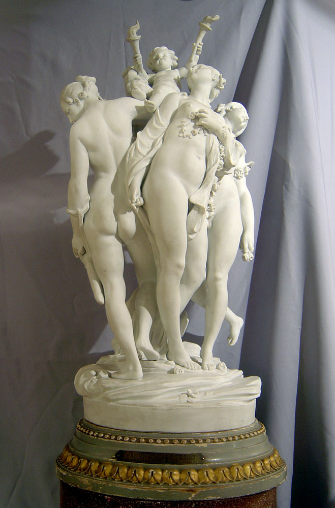 Antique Sevres porcelain signed and dated monumental bisque piece of three nymphs holding a cupid.