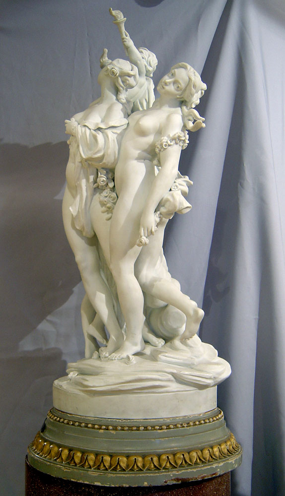 Antique Sevres porcelain signed and dated monumental bisque piece of three nymphs holding a cupid.