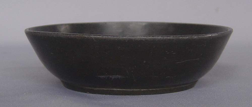 Antique sculpture of Disraeli in a Pewter dish.
