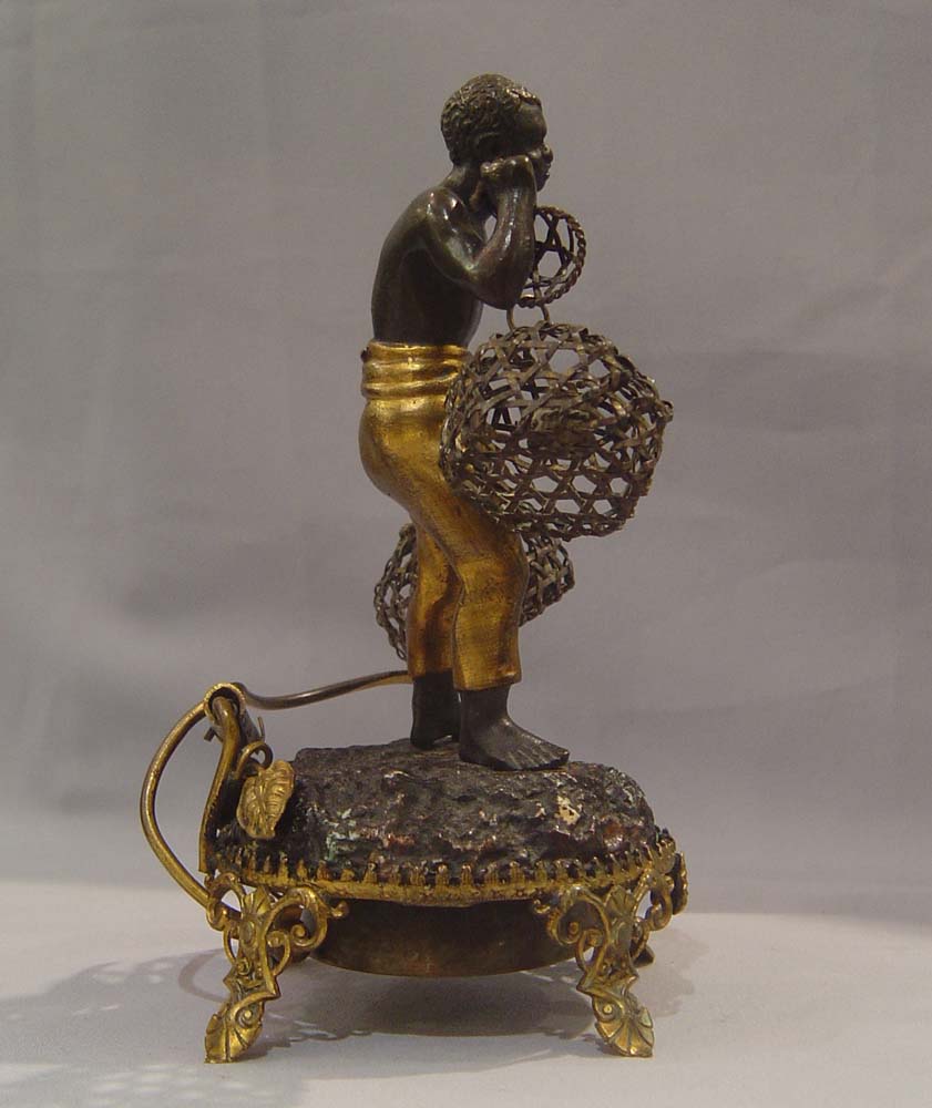 Blackamoor or au negre bronze antique servant summoning bell.