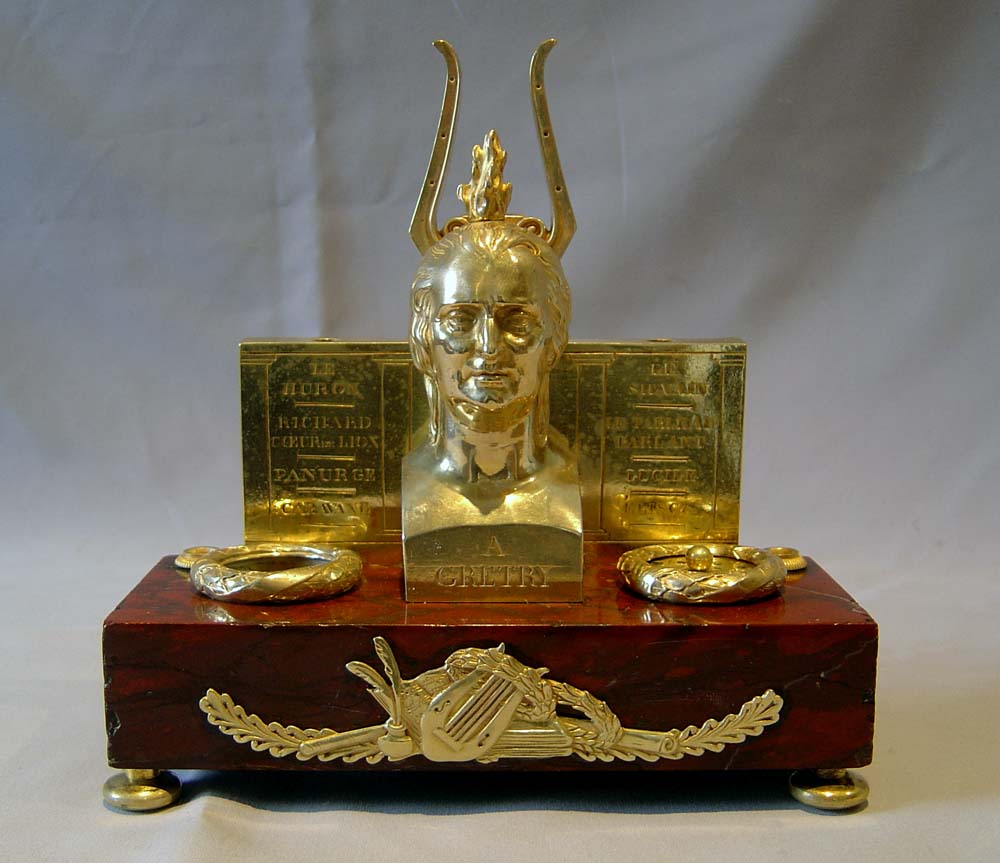 Antique French Empire ecrier in ormolu and rouge marble celebrating the composer Andre Gretry.