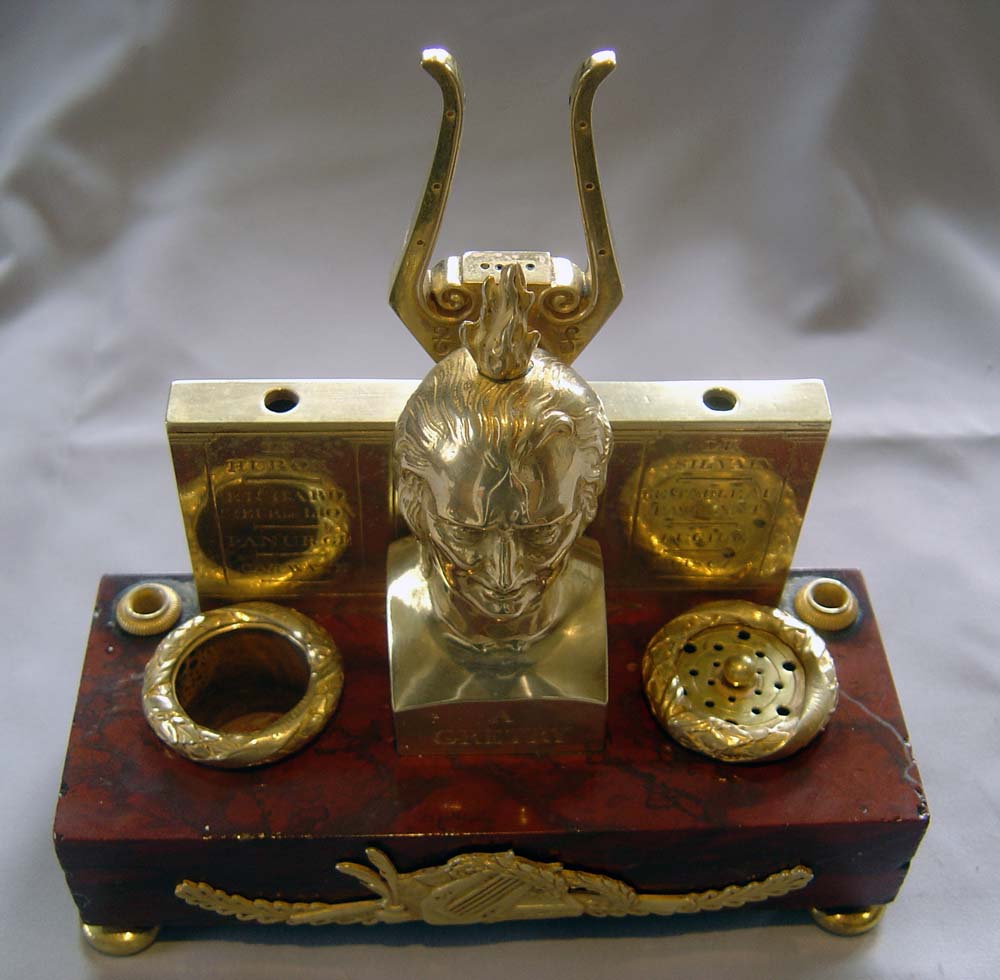 Antique French Empire ecrier in ormolu and rouge marble celebrating the composer Andre Gretry.