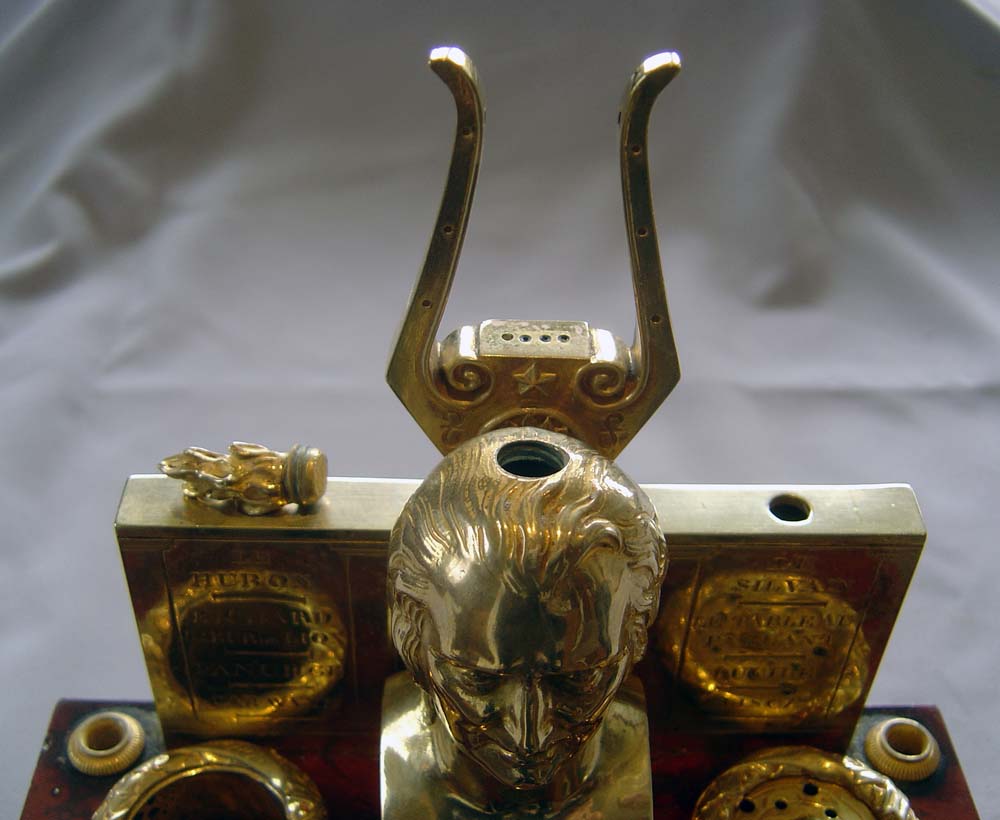 Antique French Empire ecrier in ormolu and rouge marble celebrating the composer Andre Gretry.