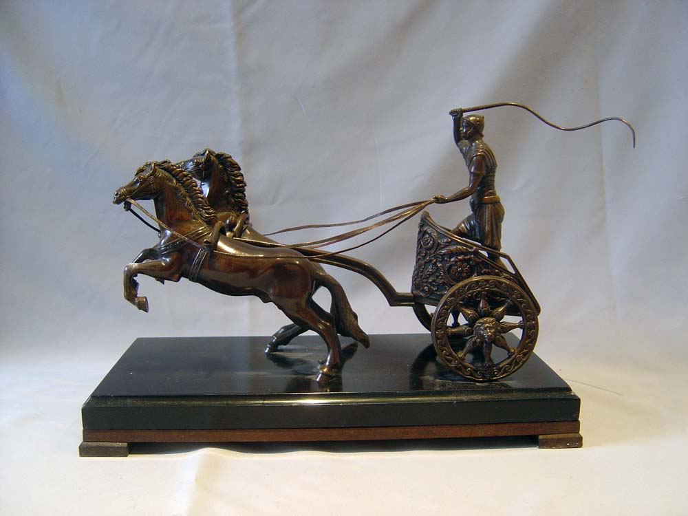 Antique Grand Tour bronze of charioteer on marble base.