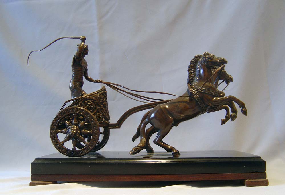 Antique Grand Tour bronze of charioteer on marble base.