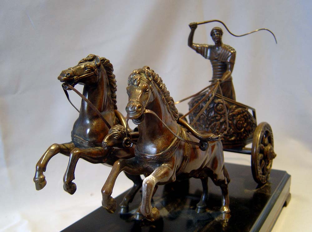 Antique Grand Tour bronze of charioteer on marble base.