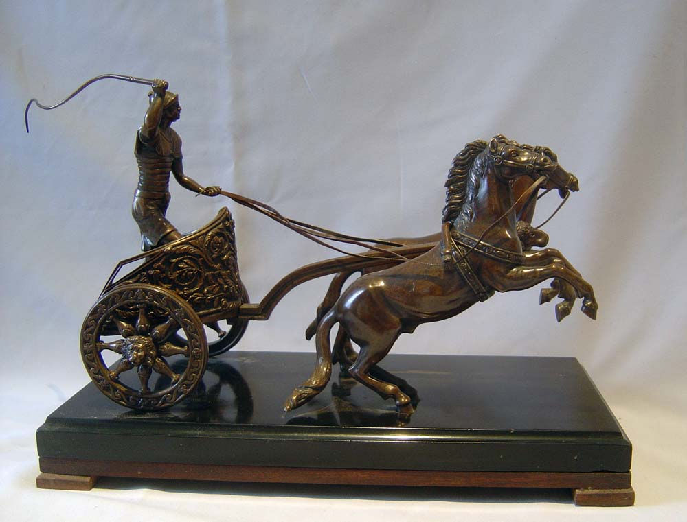 Antique Grand Tour bronze of charioteer on marble base.