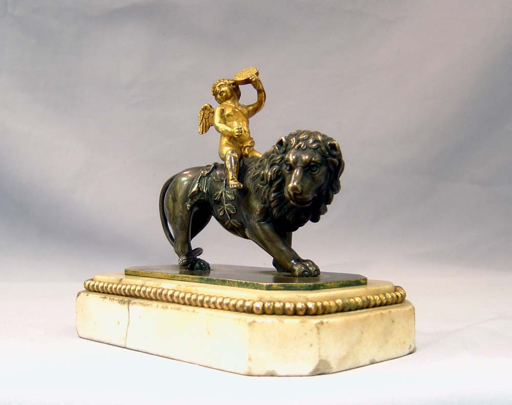 Antique Thomas Weeks Tichbourne Str. Paperweight of Cupid and Lion.