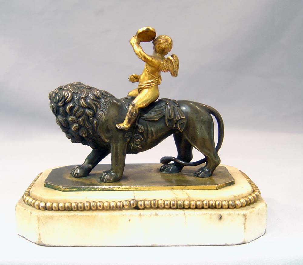Antique Thomas Weeks Tichbourne Str. Paperweight of Cupid and Lion.