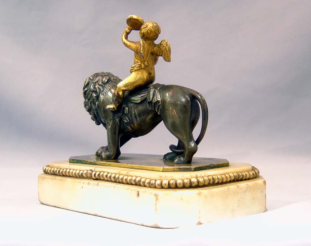 Antique Thomas Weeks Tichbourne Str. Paperweight of Cupid and Lion.