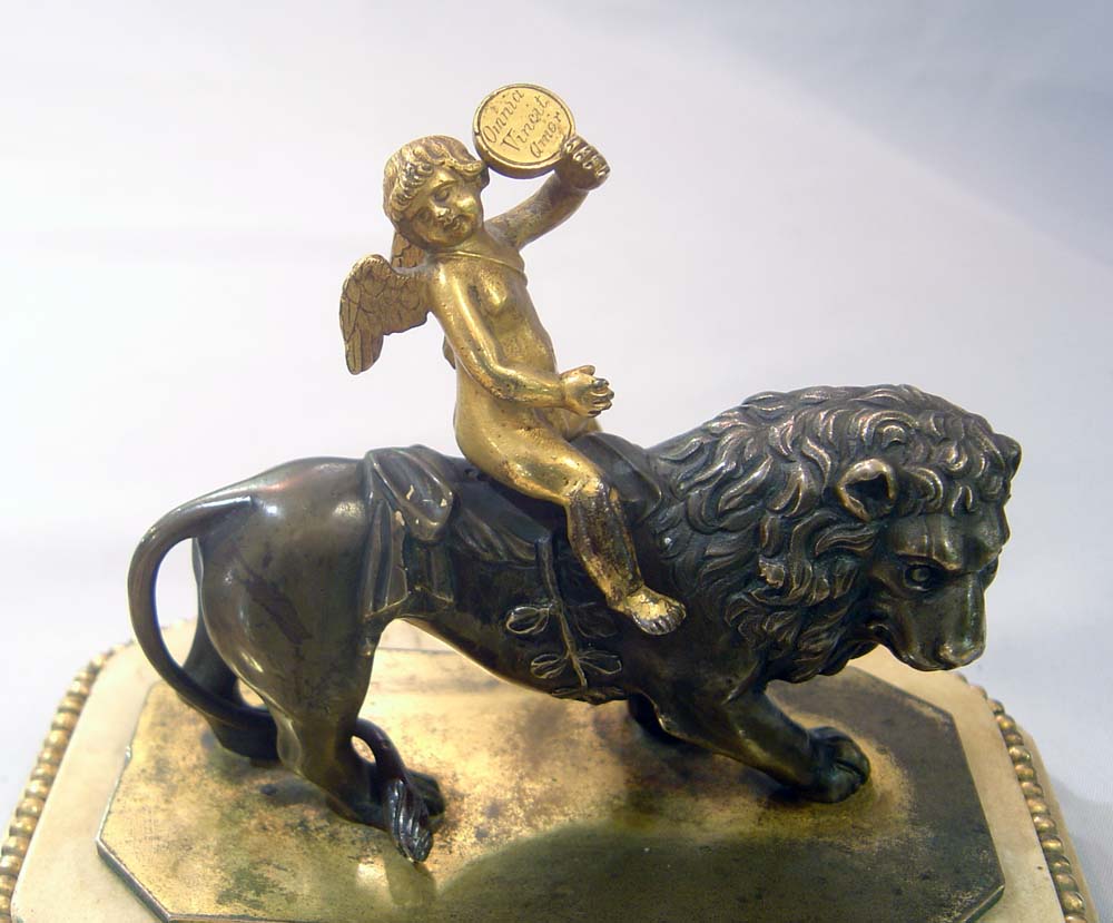 Antique Thomas Weeks Tichbourne Str. Paperweight of Cupid and Lion.