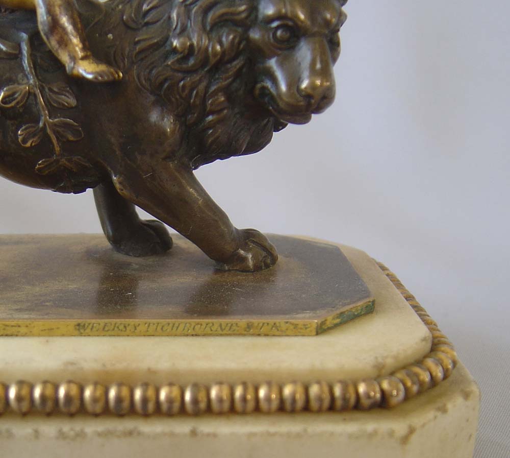 Antique Thomas Weeks Tichbourne Str. Paperweight of Cupid and Lion.