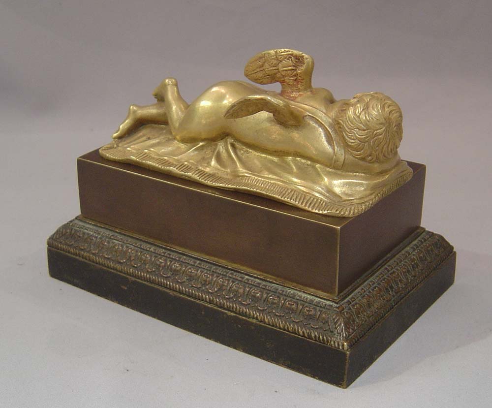 Antique French Empire inkwell with cupid asleep.