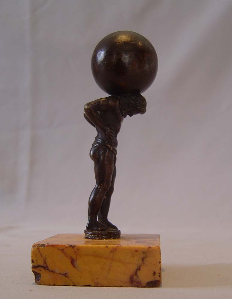 Small Italian Grand Tour bronze of Atlas holding up the world on Sienna marble base.