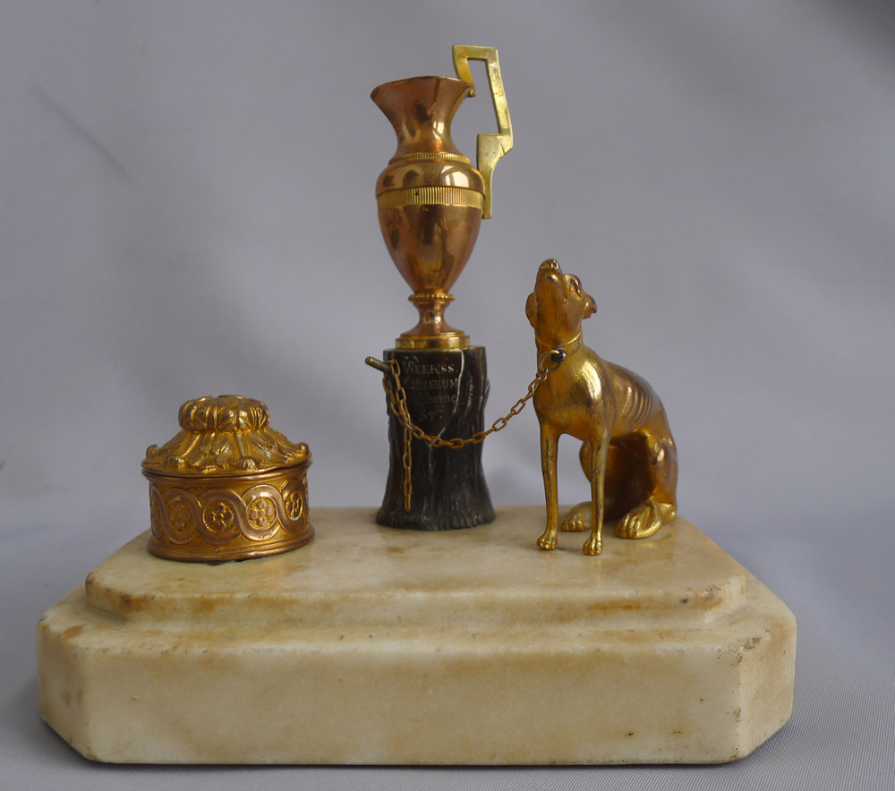 Antique Thomas Weeks inkwell with dog, tree stump and urn.