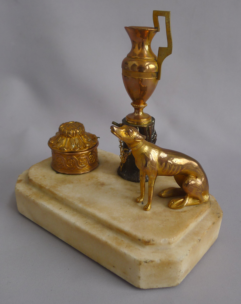 Antique Thomas Weeks inkwell with dog, tree stump and urn.