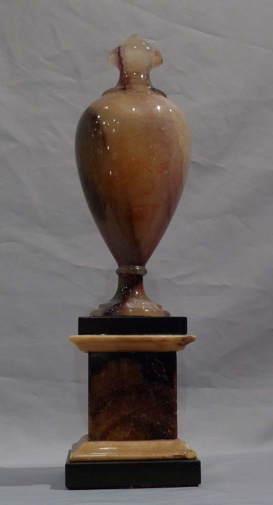 Blue John urn, Matlock, on square base of BlueJohn with white and black Derbyshire marble mouldings.