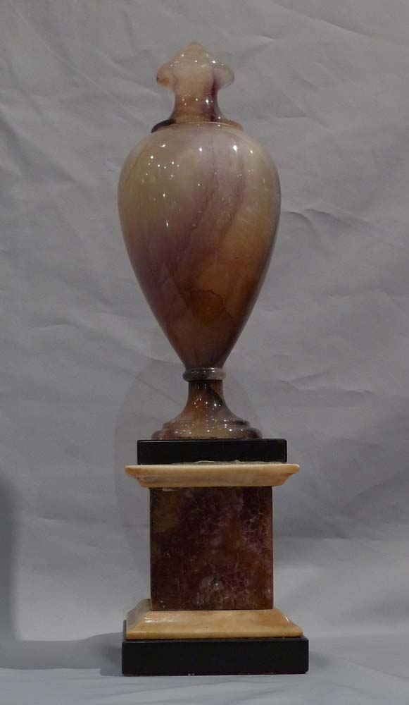 Blue John urn, Matlock, on square base of BlueJohn with white and black Derbyshire marble mouldings.