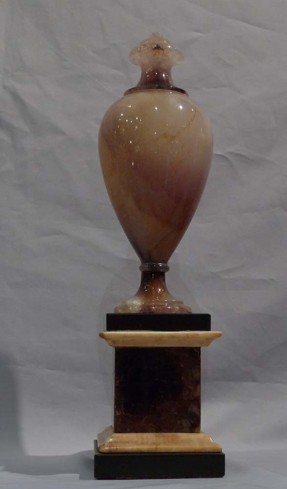 Blue John urn, Matlock, on square base of BlueJohn with white and black Derbyshire marble mouldings.