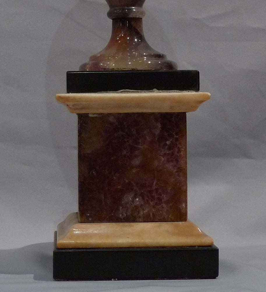 Blue John urn, Matlock, on square base of BlueJohn with white and black Derbyshire marble mouldings.