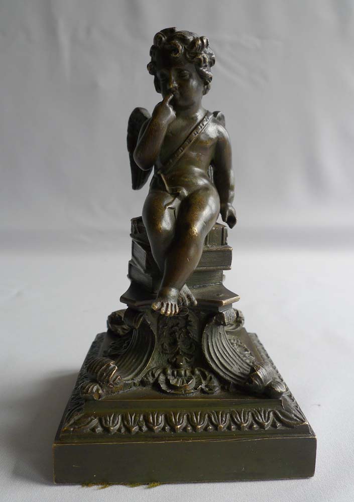 Antique English Regency bronze of winged cupid on fine base.