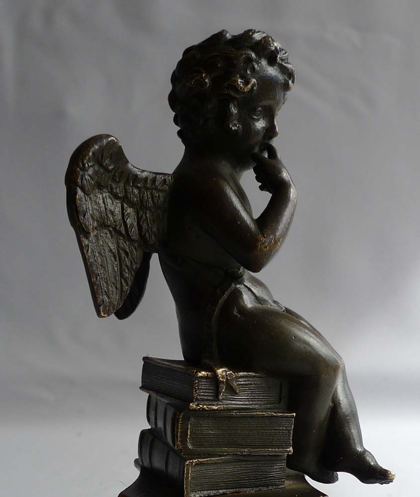 Antique English Regency bronze of winged cupid on fine base.