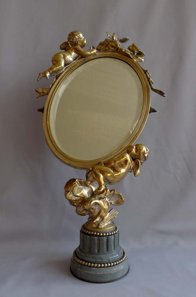 Antique French Napoleon III ormolu and silvered bronze mirror with cupids signed and dated 1870