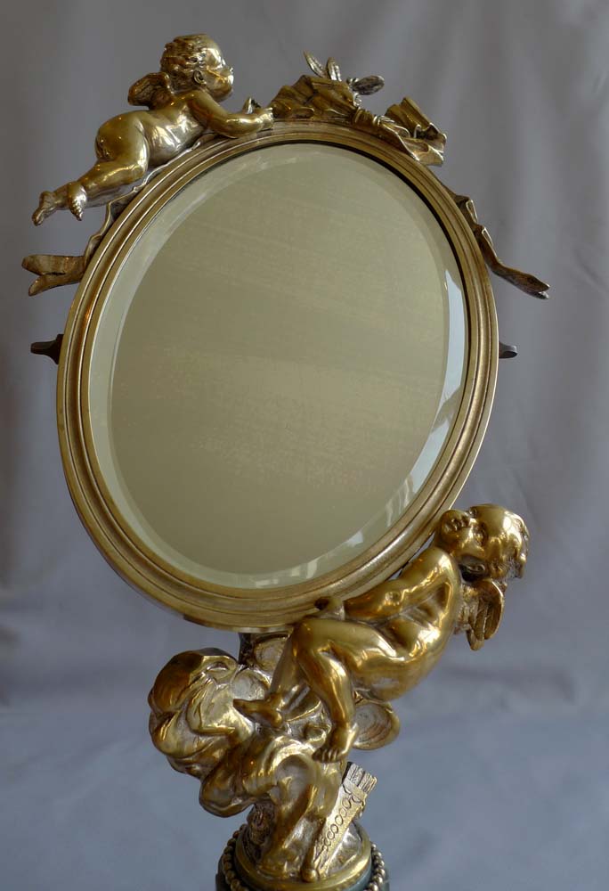 Antique French Napoleon III ormolu and silvered bronze mirror with cupids signed and dated 1870