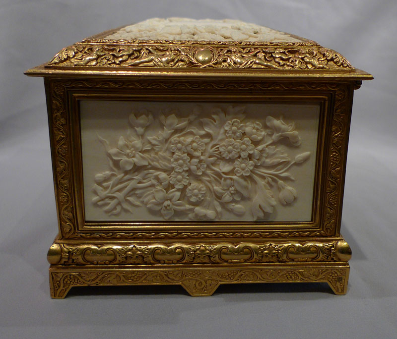 Antique carved ivory and ormolu casket.