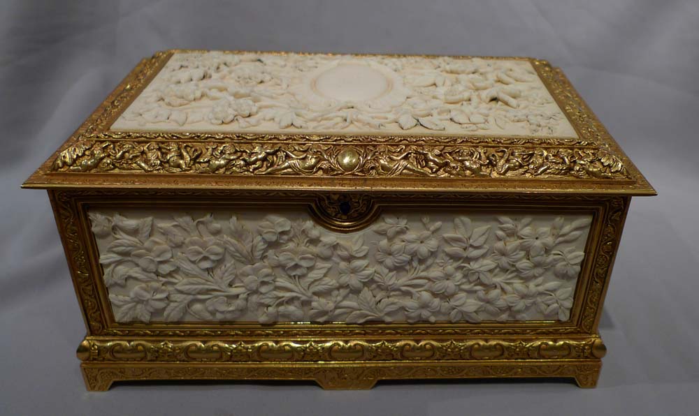 Antique carved ivory and ormolu casket.