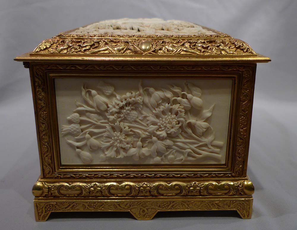 Antique carved ivory and ormolu casket.