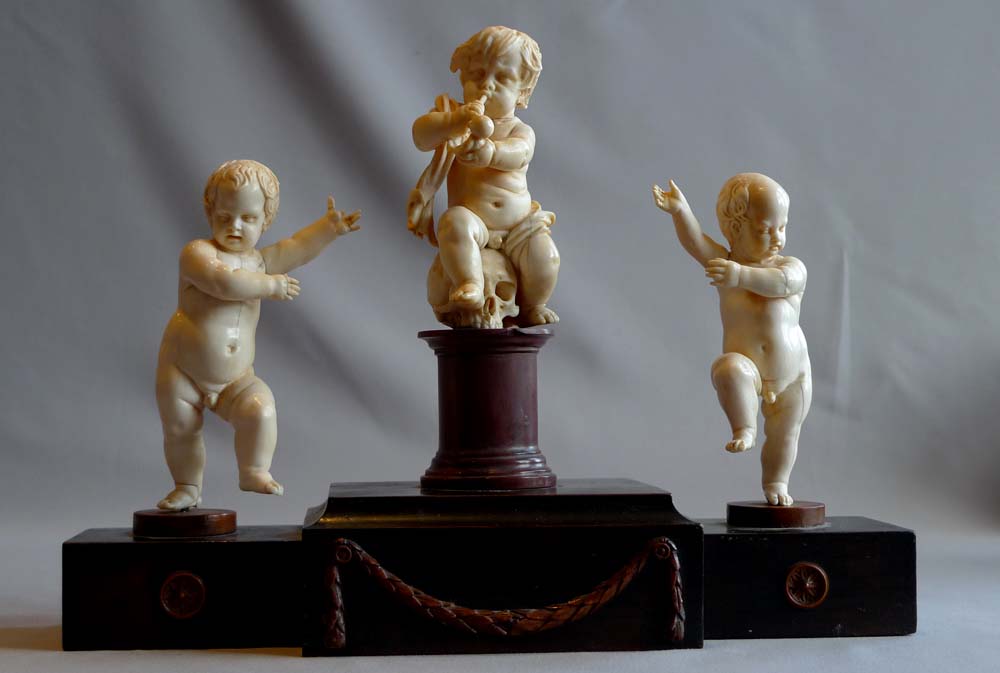 European 18th century ivory group on breakfront base.