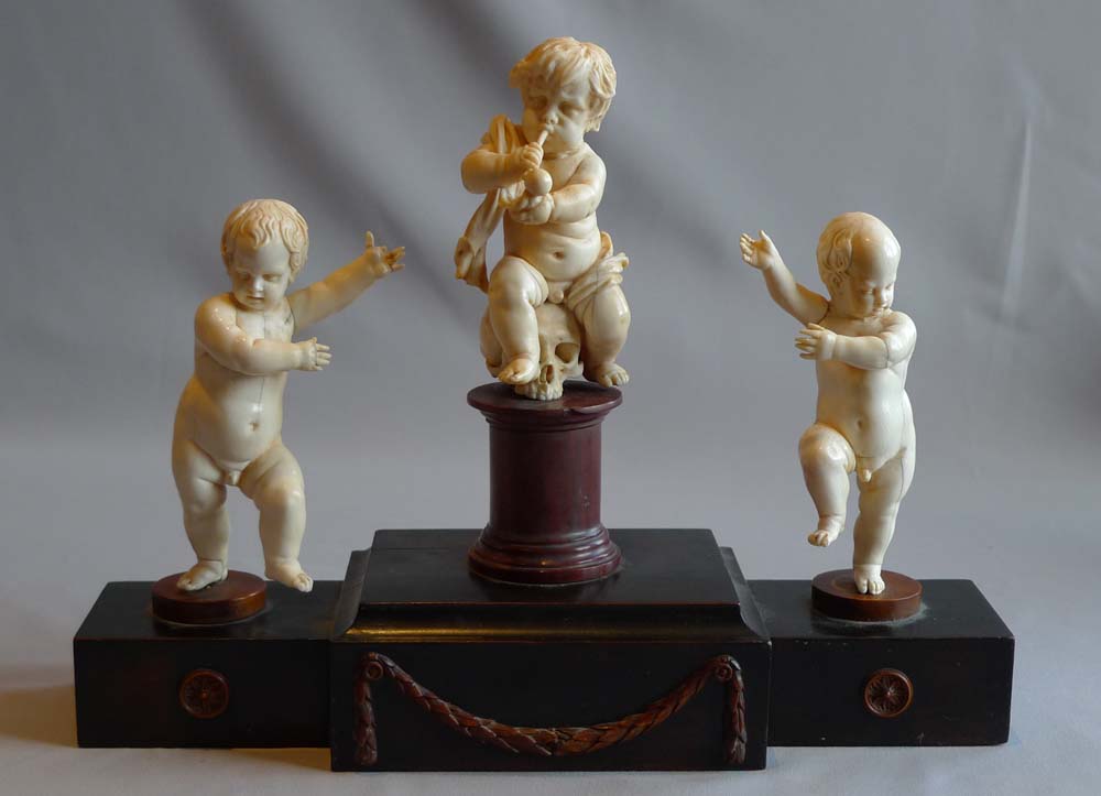 European 18th century ivory group on breakfront base.