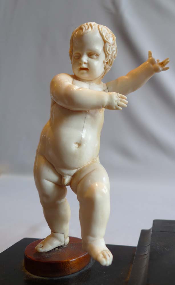 European 18th century ivory group on breakfront base.