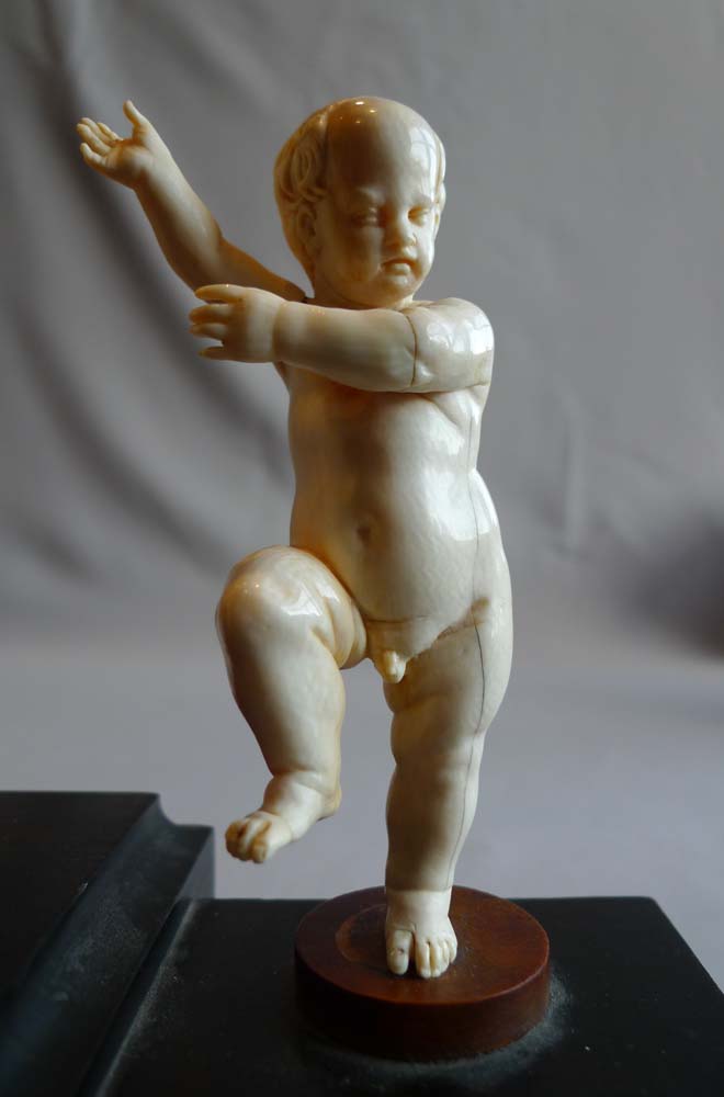 European 18th century ivory group on breakfront base.