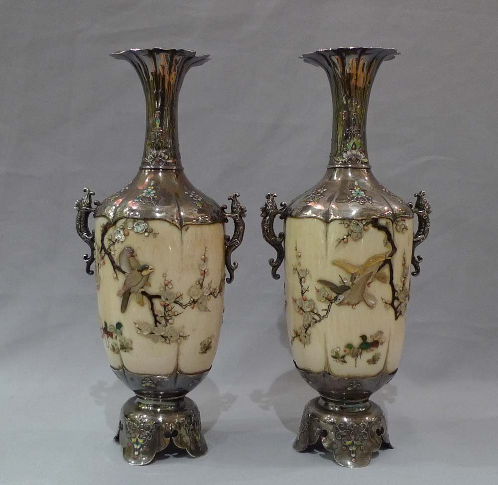 Japanese shibayama vases, a pair in ivory, silver, mother of pearl and semi precious stones.
