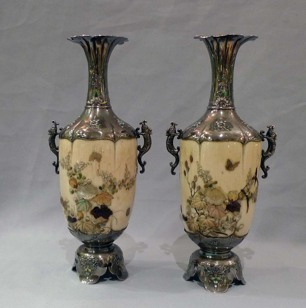 Japanese shibayama vases, a pair in ivory, silver, mother of pearl and semi precious stones.