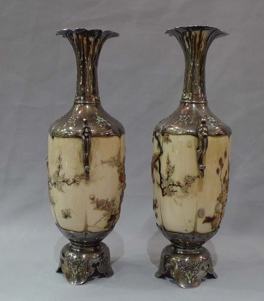 Japanese shibayama vases, a pair in ivory, silver, mother of pearl and semi precious stones.