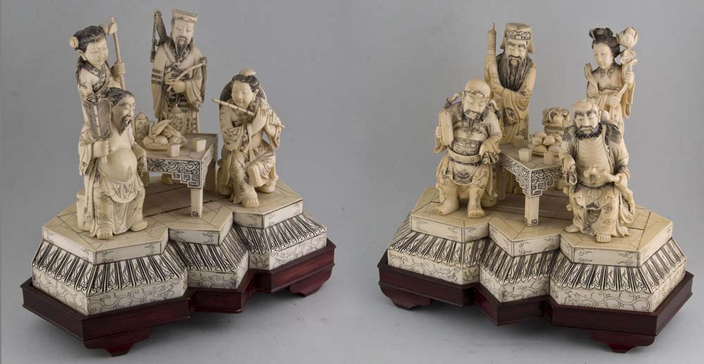 A pair of Antique ivory groups of the Eight Immortals.
