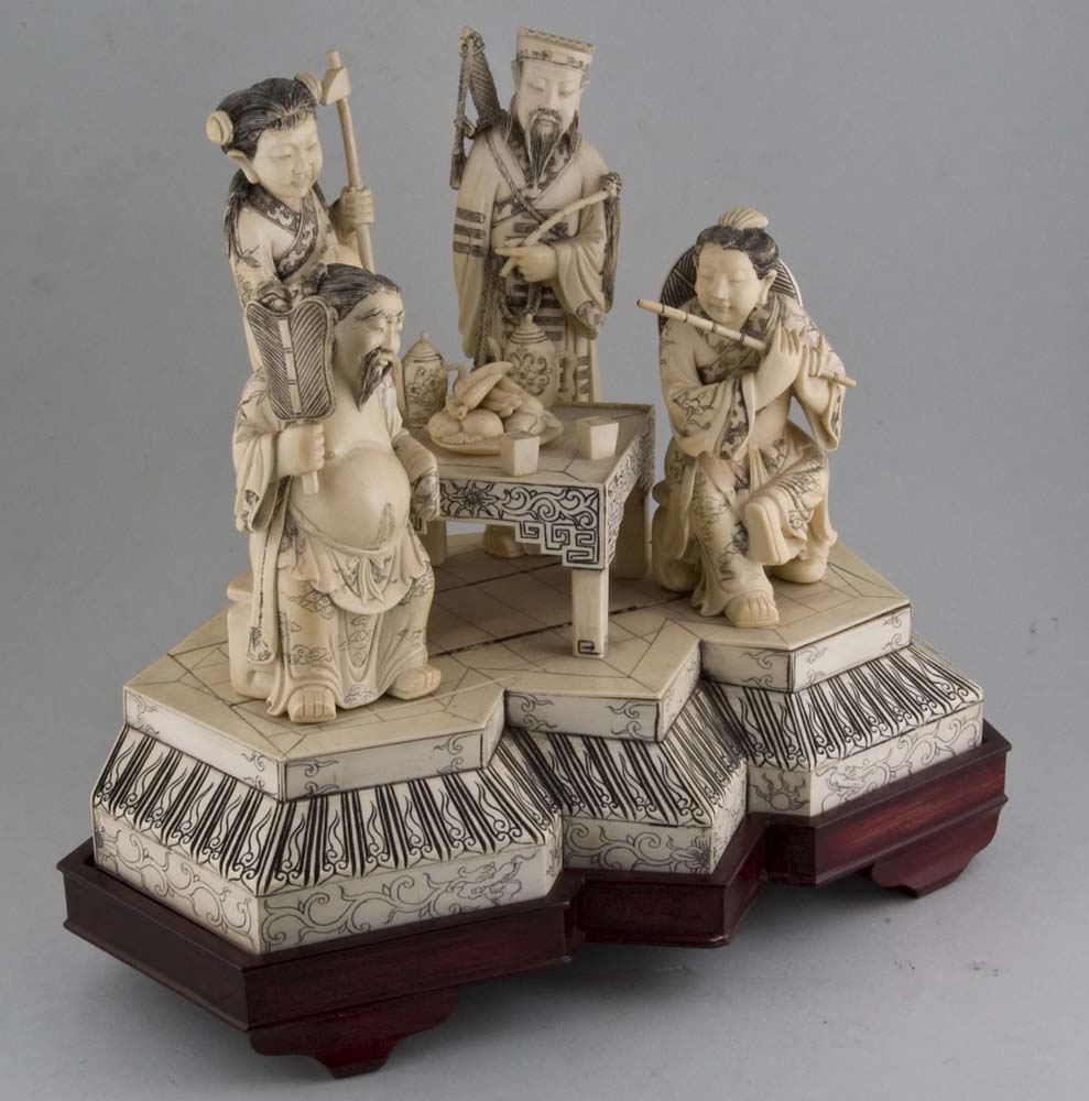 A pair of Antique ivory groups of the Eight Immortals.