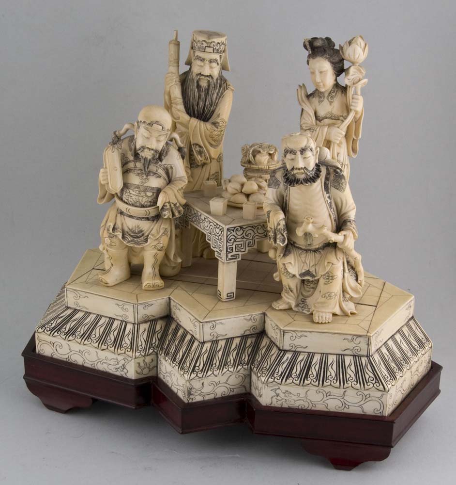A pair of Antique ivory groups of the Eight Immortals.