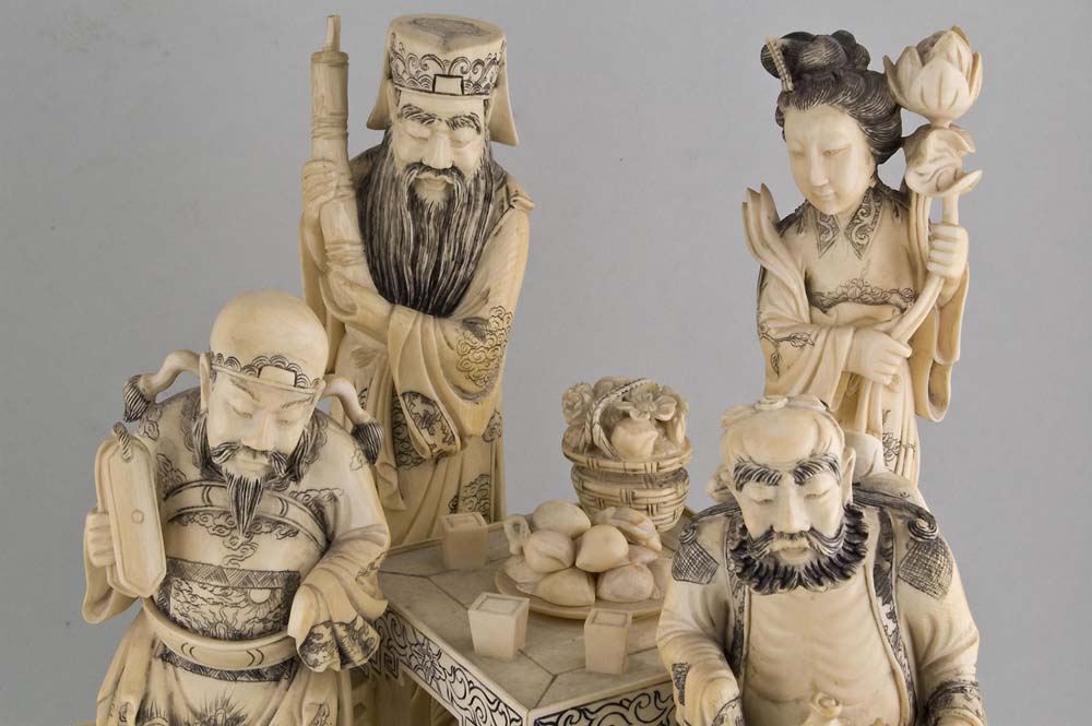 A pair of Antique ivory groups of the Eight Immortals.