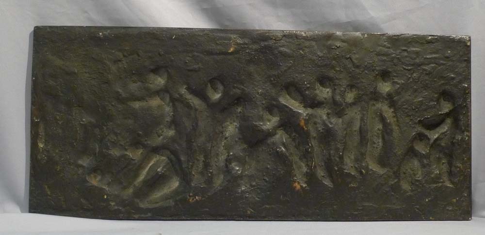 Antique bronze plaque of bacchanalian romp.