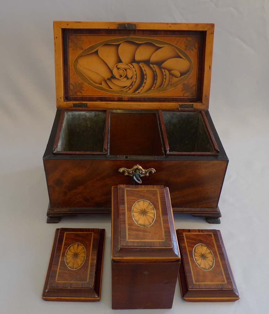 English George III inlaid mahagany triple tea caddy.
