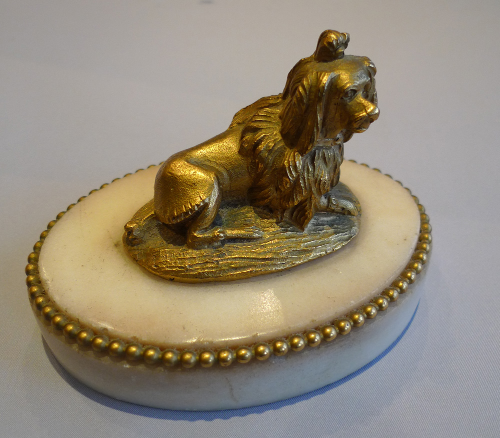 Louis XVIth antique French ormolu king Charles spaniel on oval carrera marble base.