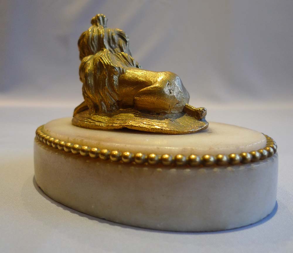 Louis XVIth antique French ormolu king Charles spaniel on oval carrera marble base.