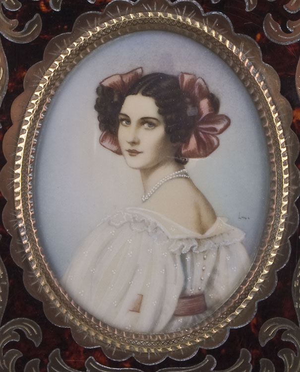 Watercolour portrait miniature on Ivory in boulle frame.
