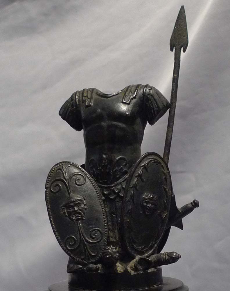 Pair antique grand tour bronze trophies of war on black marble and shaped variagated marble stems.