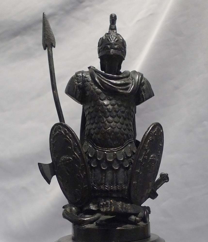 Pair antique grand tour bronze trophies of war on black marble and shaped variagated marble stems.